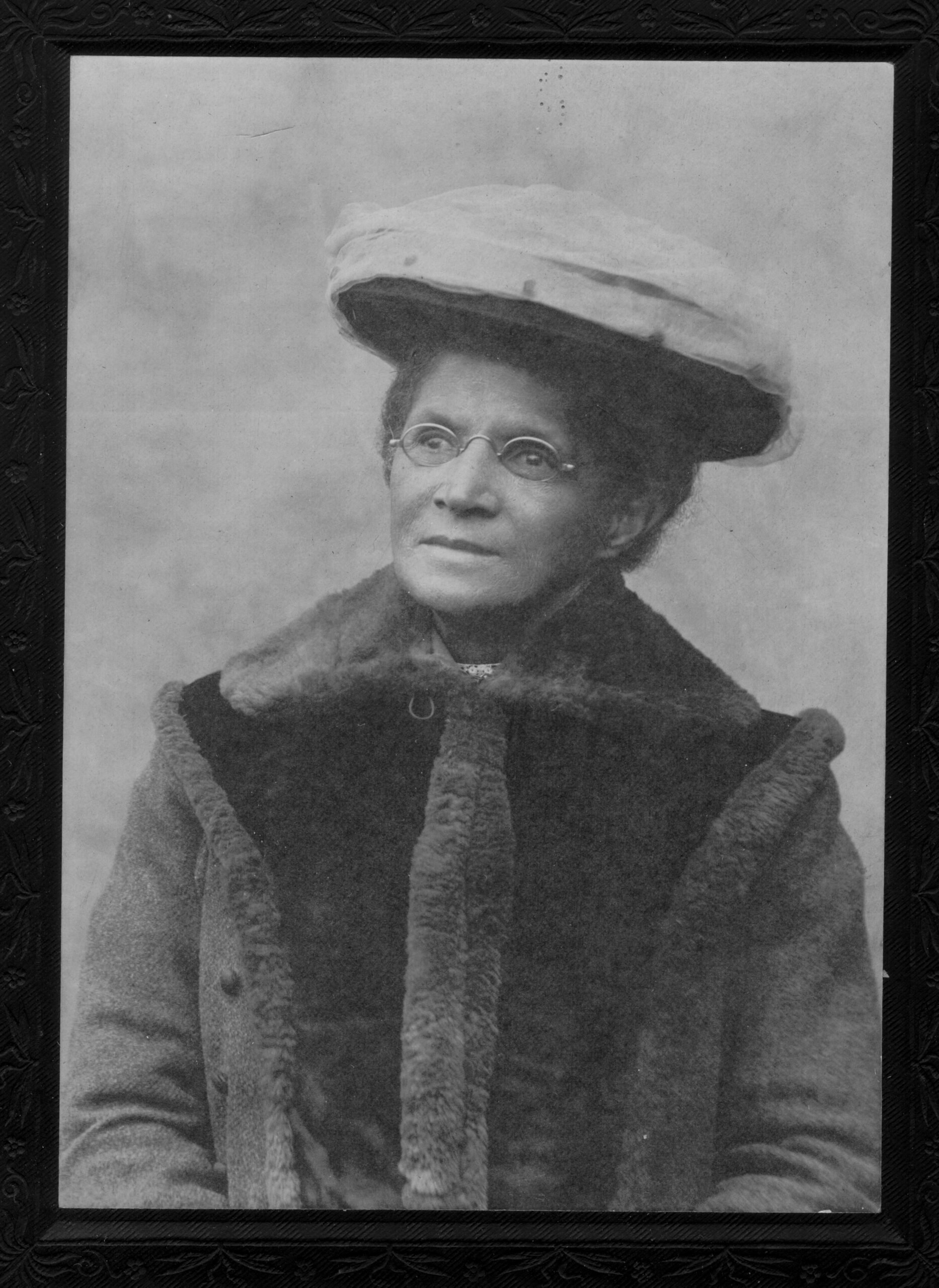 Black and white headshot of a woman